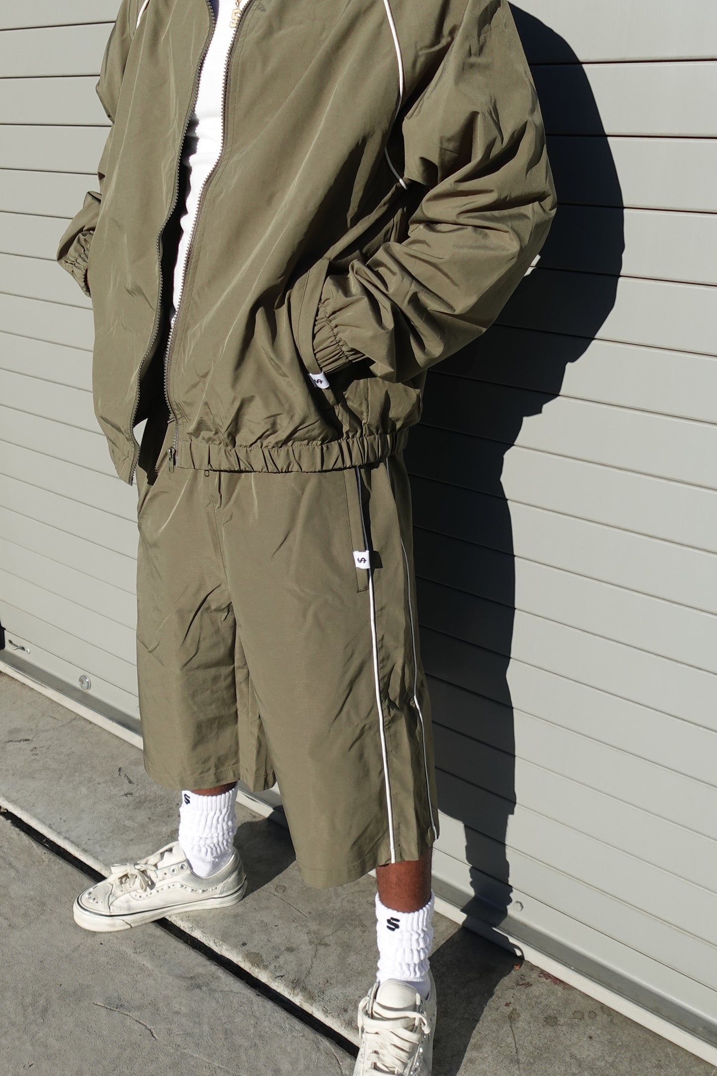 OLIVE TRACK SHORTS